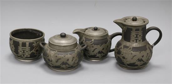 A Chinese pewter and pottery part tea set, by Hsin Ho Cheng tallest 14.5cm